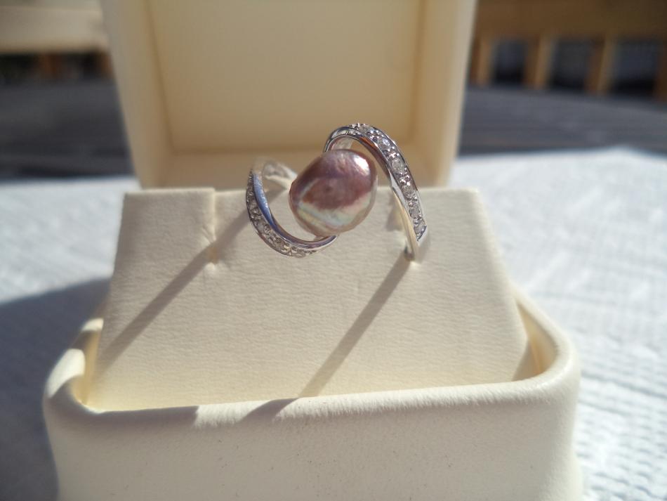 Wild caught, natural pearl set into ring