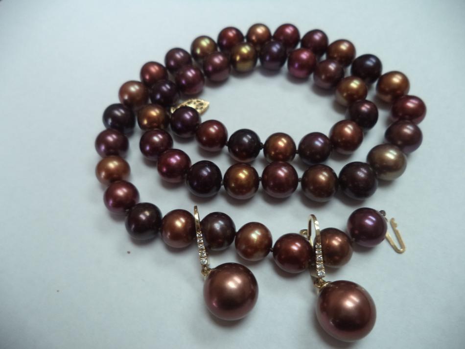 Chocolate Tahitian pearls paired with dyed freshwater strand