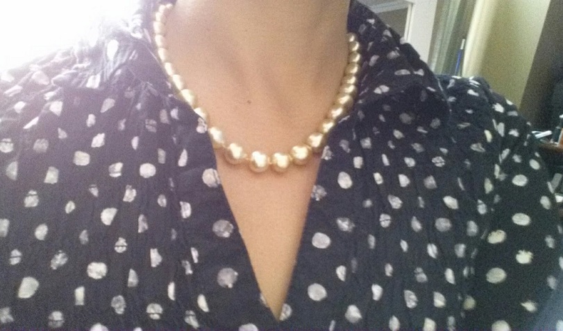 wearing gold south sea pearls at home