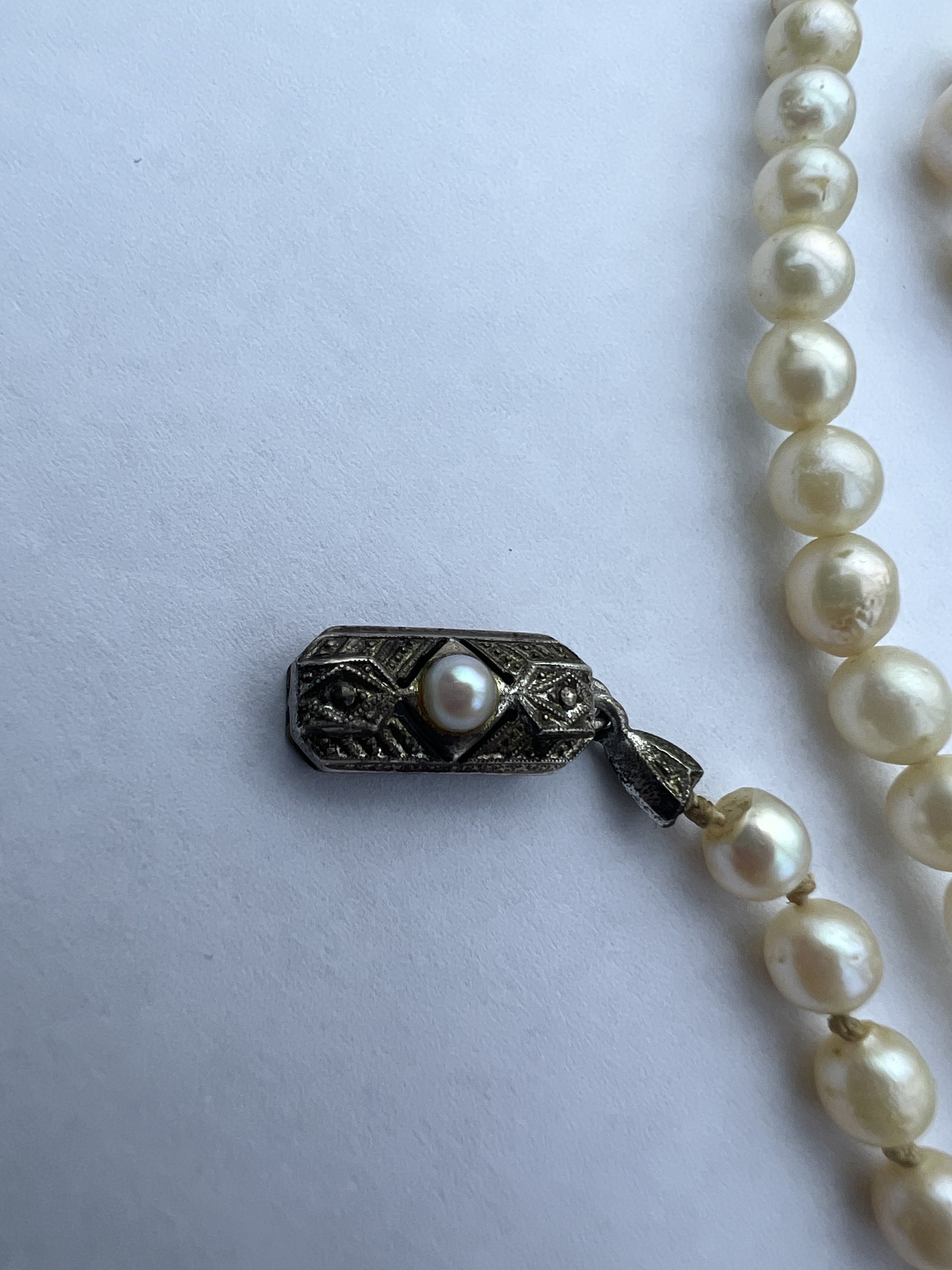 Vintage clasp on an old pearl strand