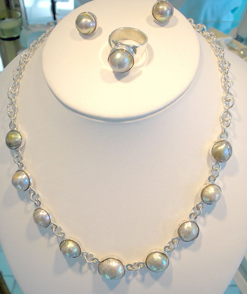 Abalone Mabe pearls set in a silver