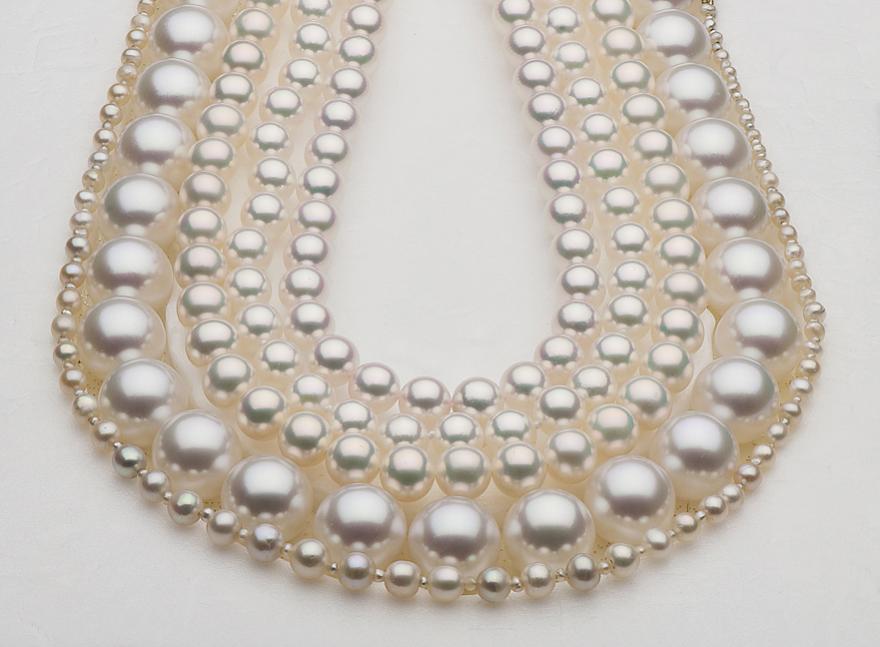 battle of the pearls with pearl paradise strands.jpg