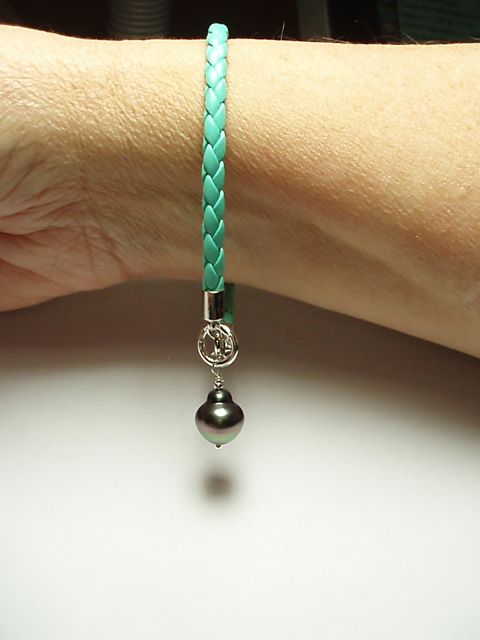 ginger-jar shaped Tahitian pearl wire wrapped on turquoise braided bracelet