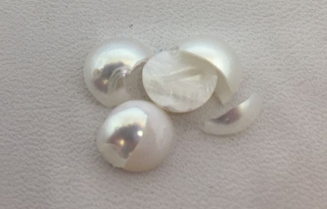 Akoya pearl crushed with nacre coatings detached