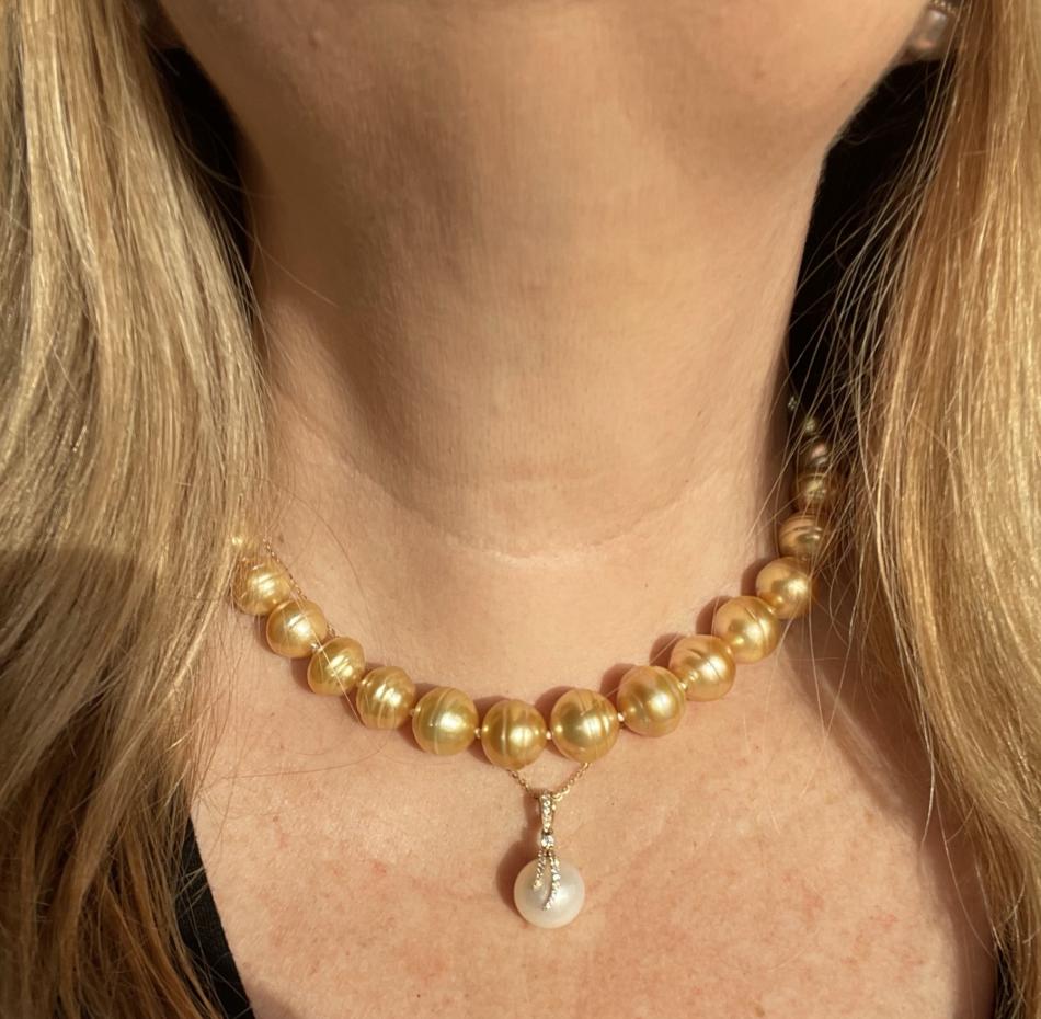 Golden south sea circle strand with pendant