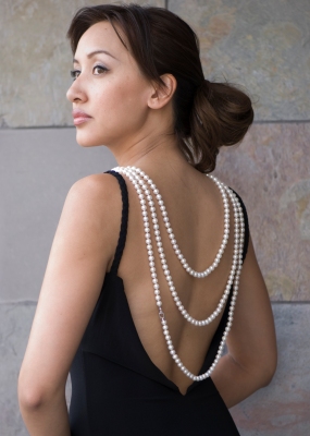 pearls draped down the back