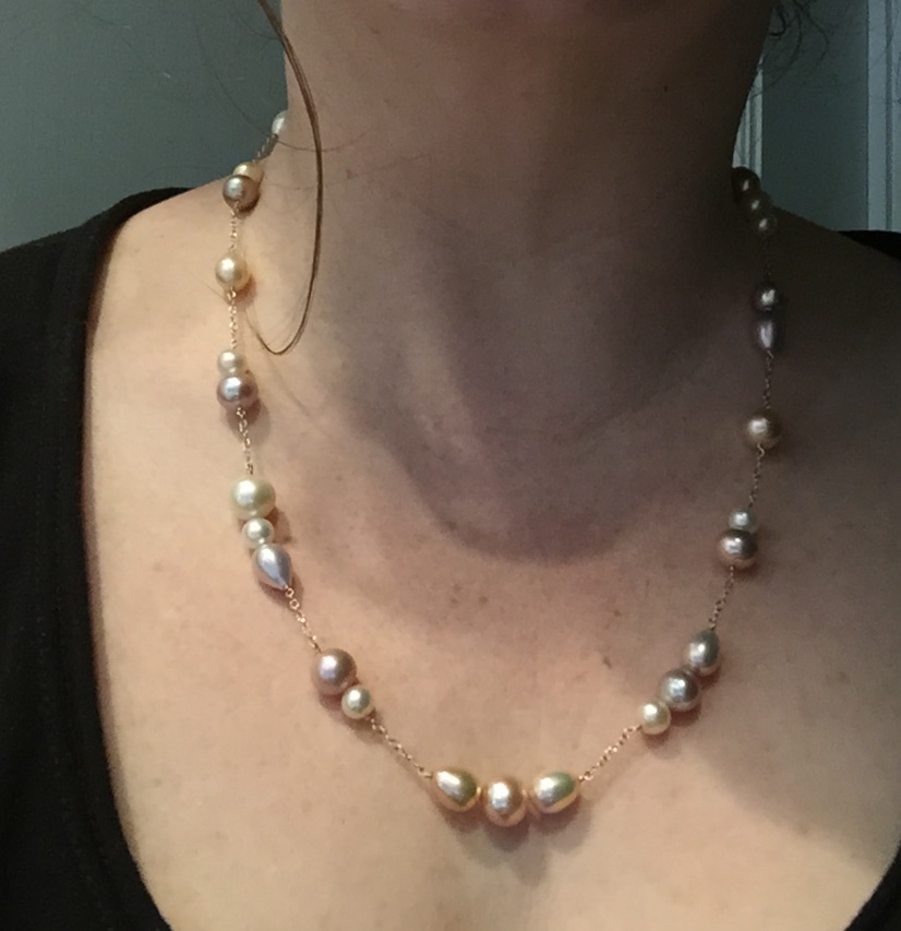 Scattered tin cup pearl necklace