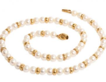  interesting necklace with 14k gold beads between every couple pearls