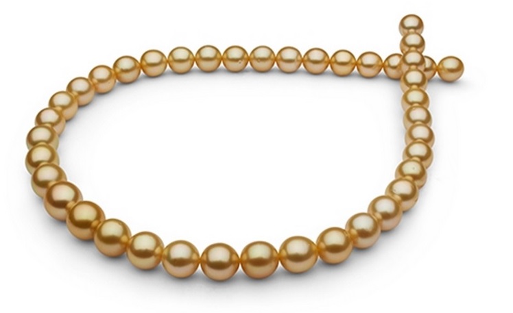Pearl Paradise glamor shot -  Eighteen inches of 22 kt deep golden color with green overtones, drop shape, 9-11mm