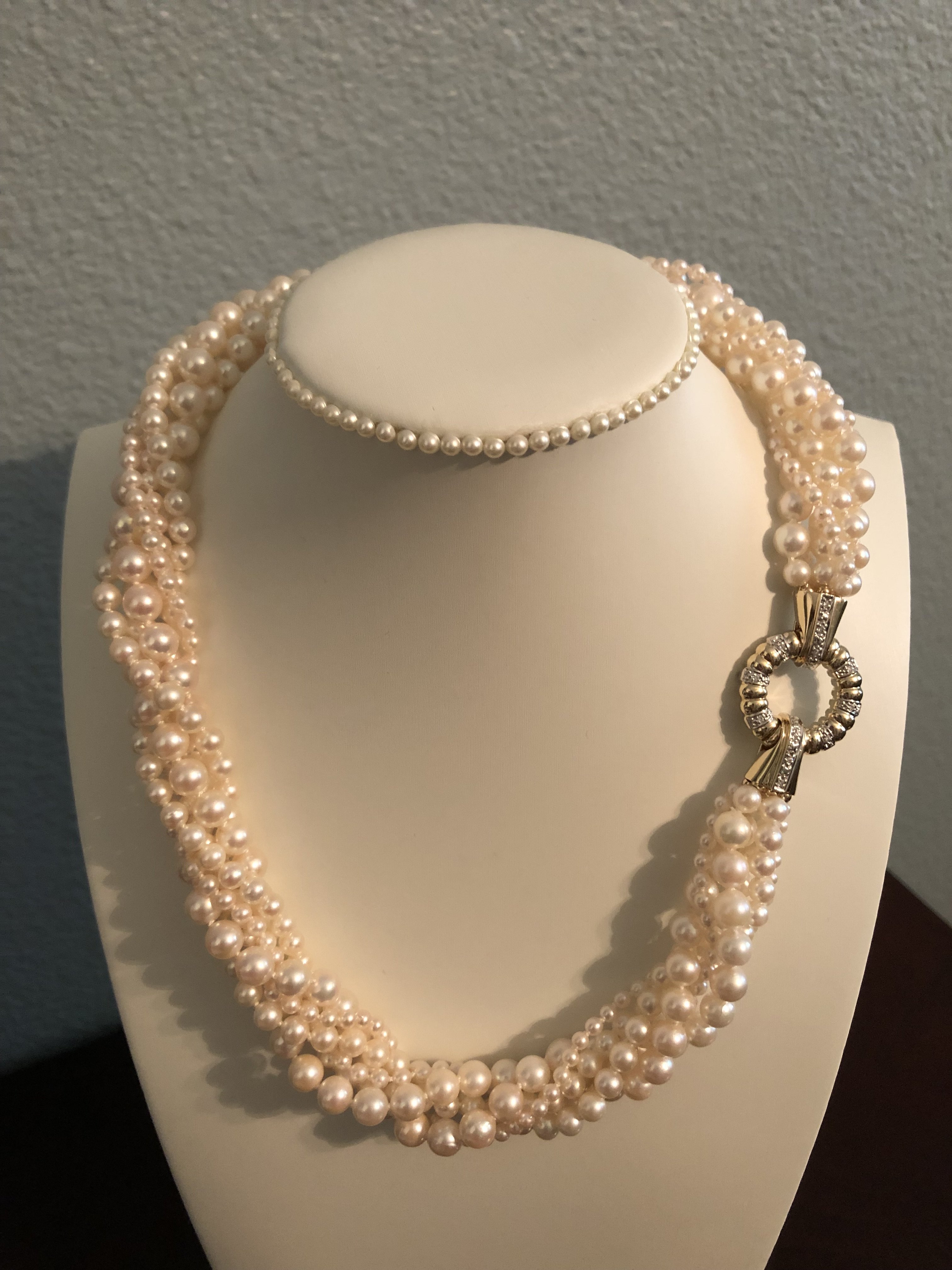 For this necklace, I worked hard to find varying sizes of Akoya pearls that would work well together. 2-3mm, 1-4.5mm, 1-5mm, 1-5.5mm, 1-6-6.5mm. I was so happy to find all of these different strands and have them match so well in color and quality. It was quite a search. The true challenge was getting the lengths to work. The necklace is 18 long twisted (19 untwisted) and the clasp is 14K Yellow/White Gold with tiny diamonds.