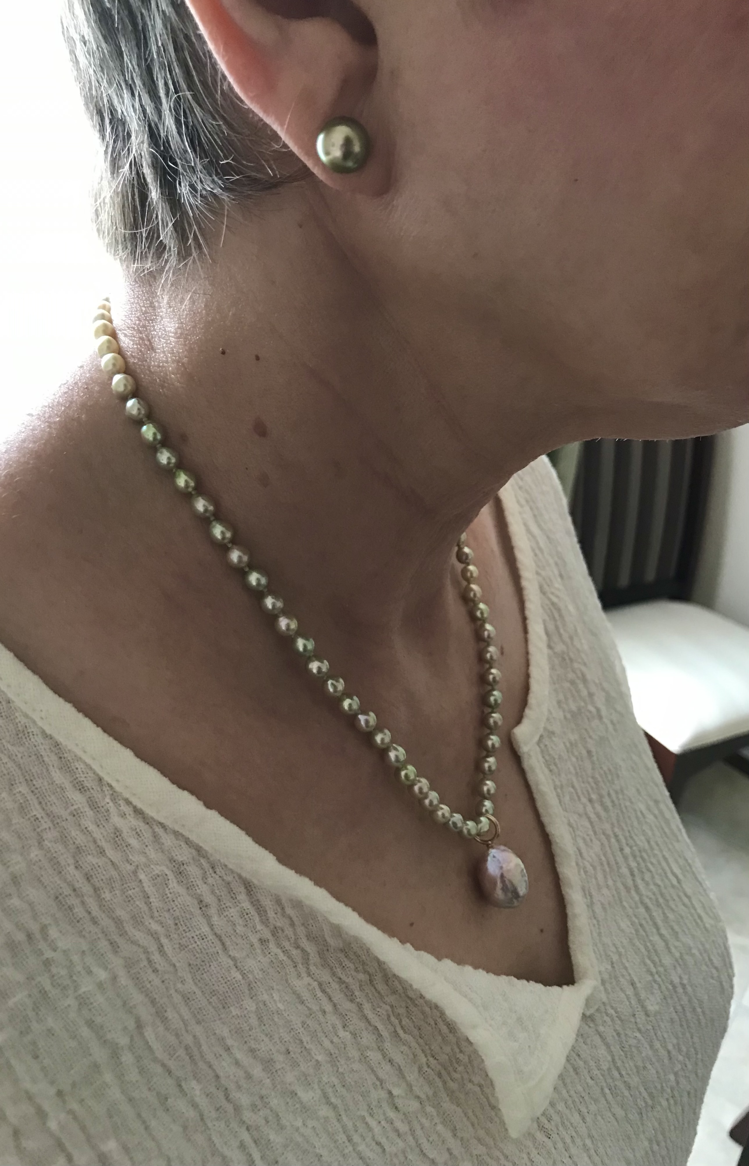 Spring Blossom (Kojima pendant) on a unique pistachio, baroque akoya necklace from Pearl Paradise