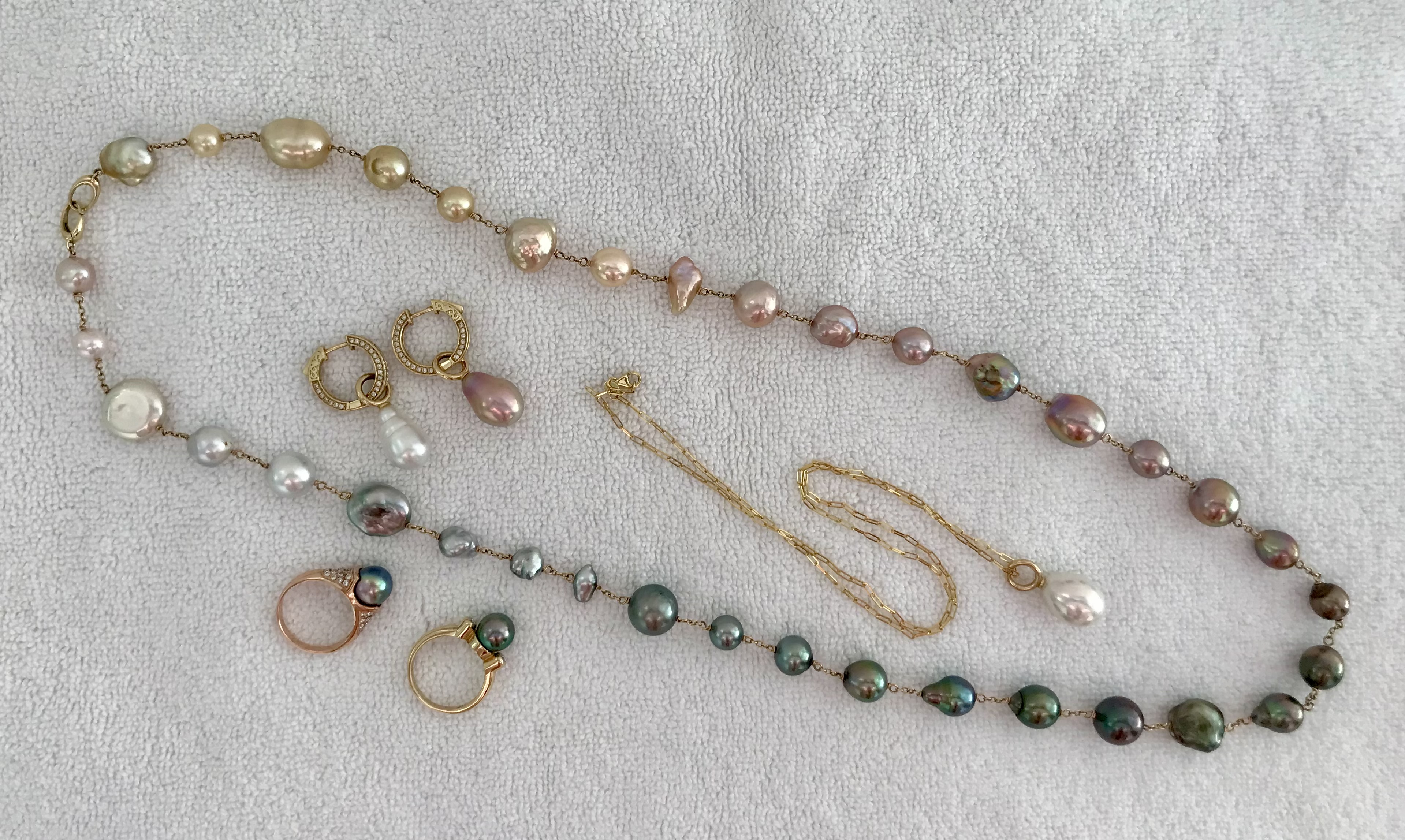 Ombre' tin-cup, The Queen pendant, Winter Snowman and Summer Rain pendants on earring hoops Sea of Cortez pearl from Douglas in the Pearl Paradise rose gold ring setting, and a Tahitian yellow gold ring from Kamoka