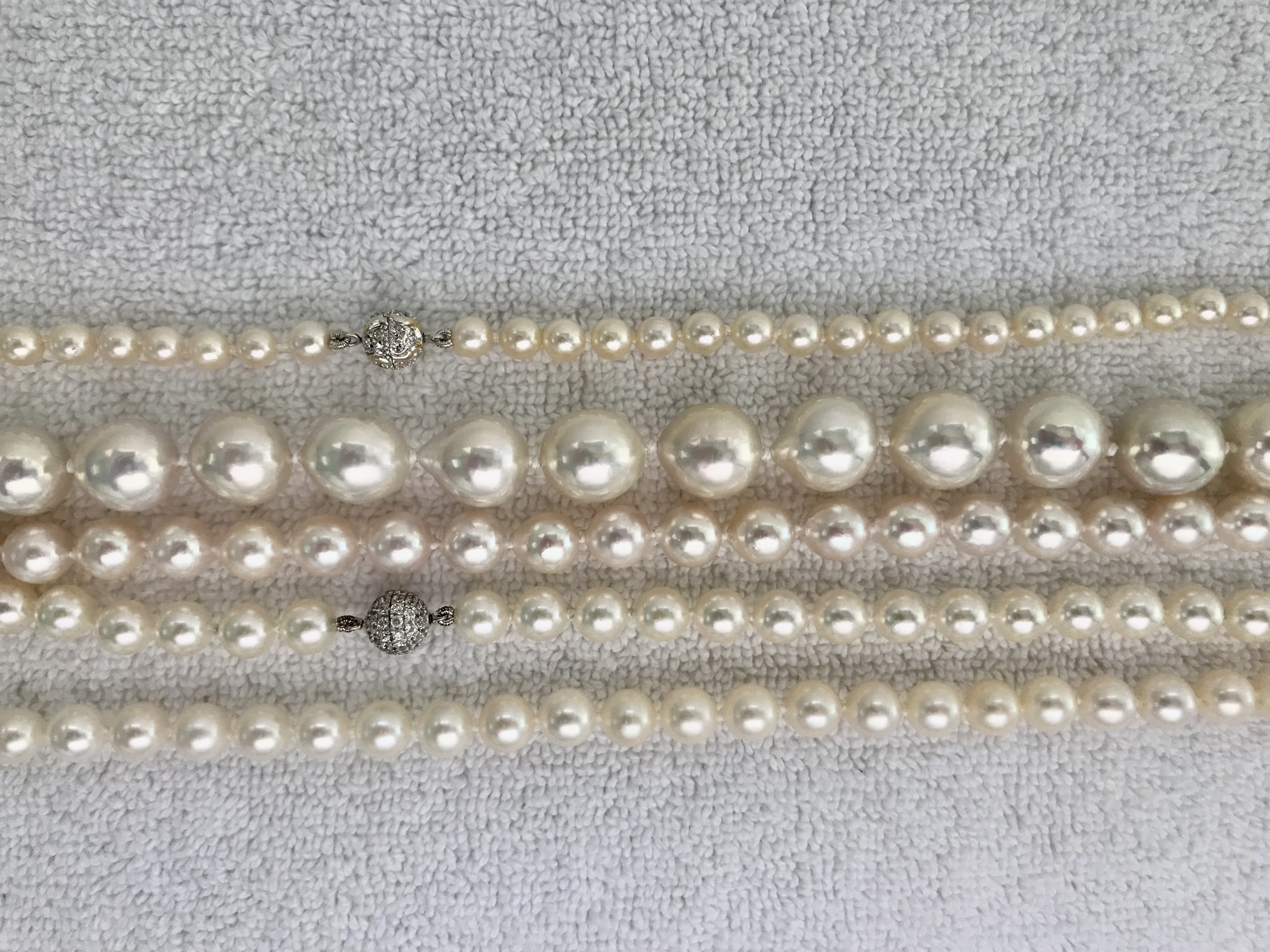 Top: First akoya bought in 1982 Second: Big baroque freshwater from Kojima Third: Baroque akoyas from Pearl Paradise Fourth: Natural white Hanadama rope from Pearl Paradise Fifth: Freshadamas from Pearl Paradise