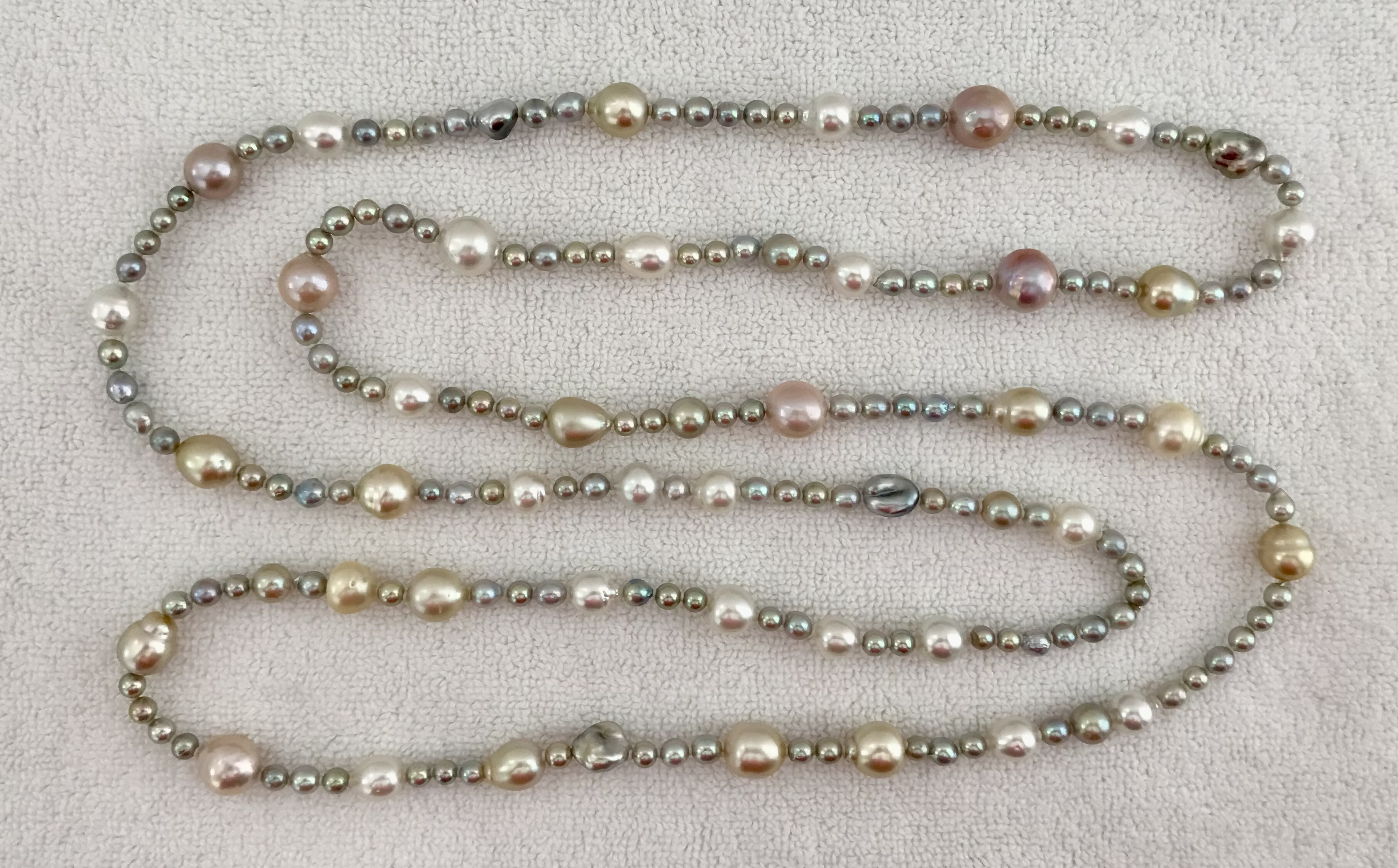 Everything Bagel rope: The large round mauve pearls are smooth Kasumi pearls.   The large white and gold pearls are South Sea.   The nuggets are Tahitian keshi from Kamoka.   And all the small pearls are blue and green baroque akoyas.