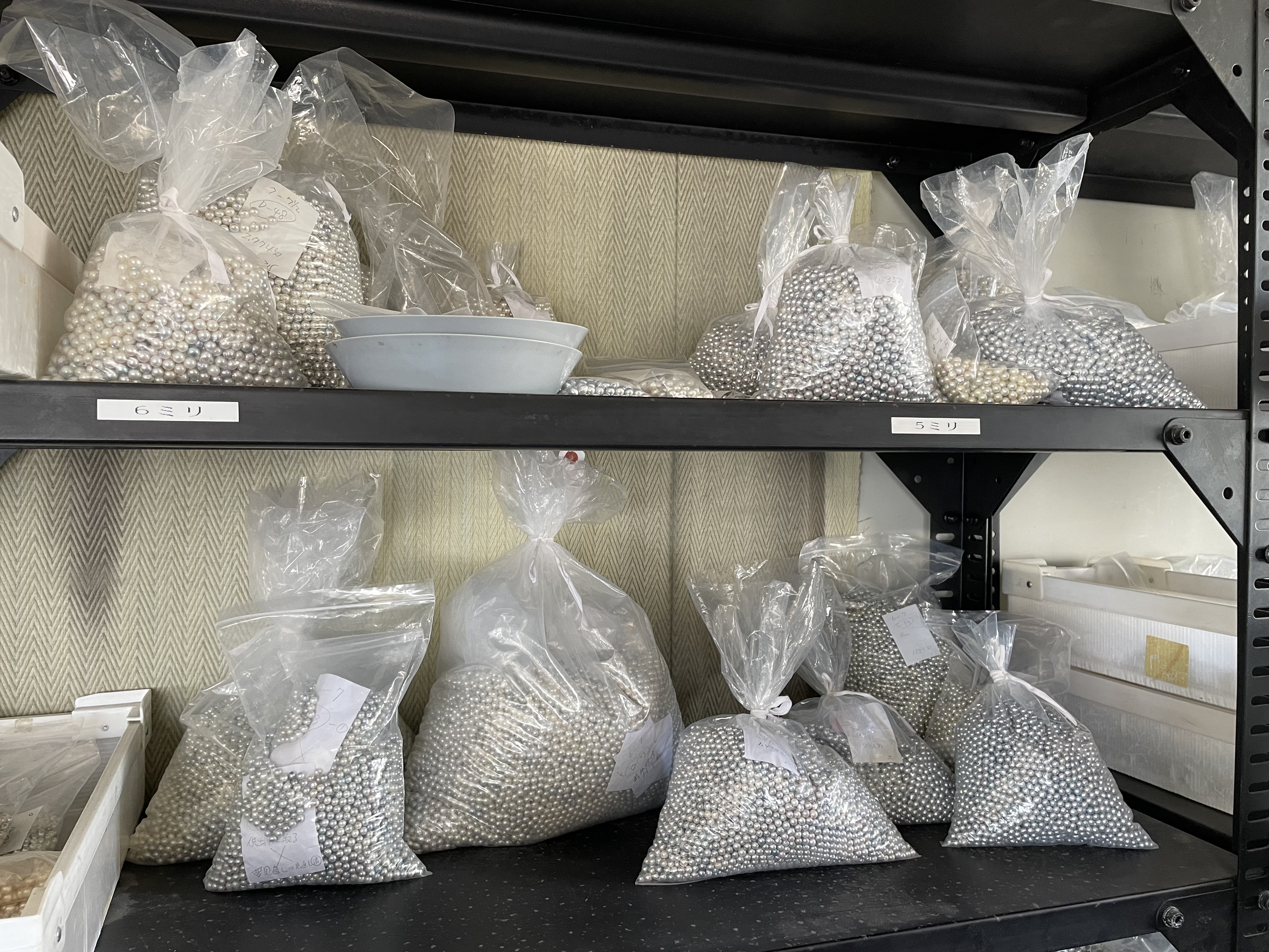 bags of pearls in their natural state waiting to be sorted and processed