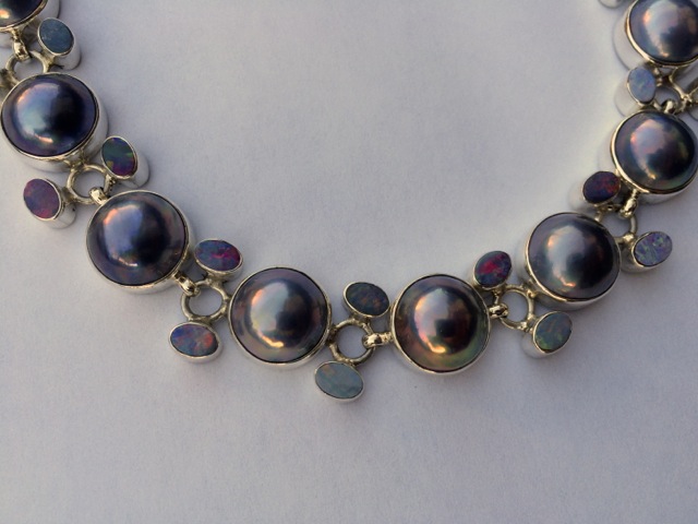 Close up mabe pearl and opal necklace from eBay