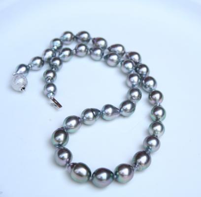 Intense peacock strand from Pearl Paradise