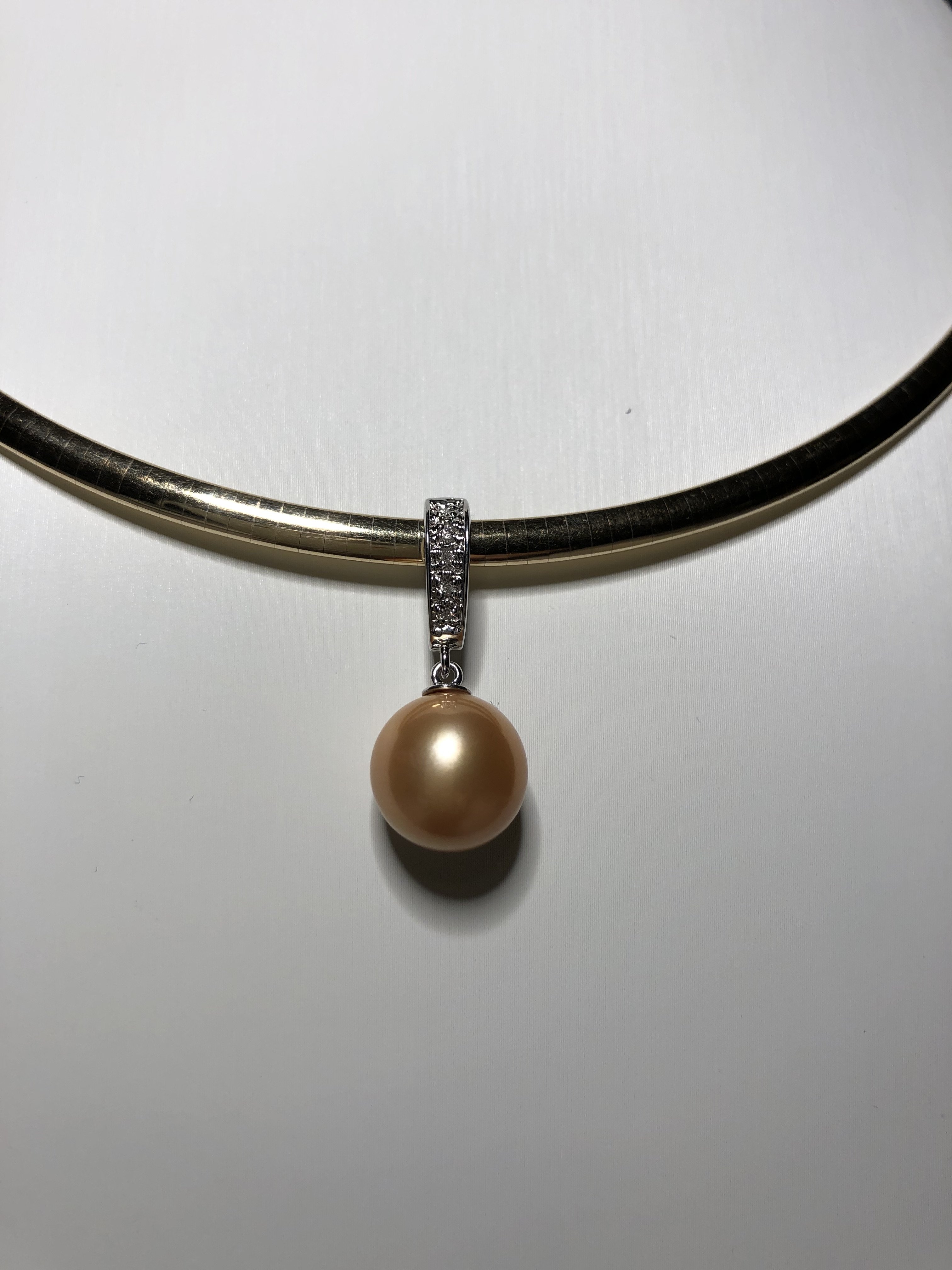 Golden south sea pearl pendant on leather