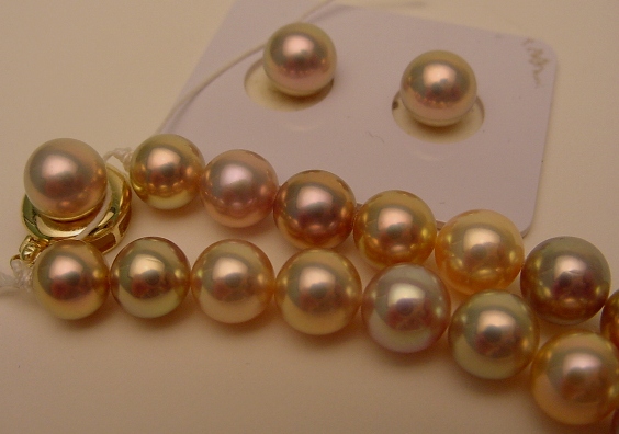 7.5 mm to 10.3 mm round clean exotic-color freshwater strand with matching studs