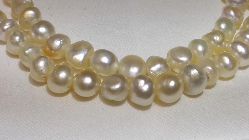 KC Bell: Natural saltwater pearl strands