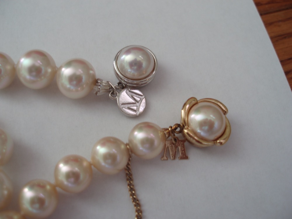 two Majorica faux pearl strands with M Tags