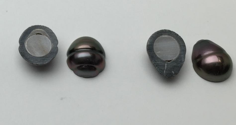 Sliced Tahitian pearls showing nacre thickness