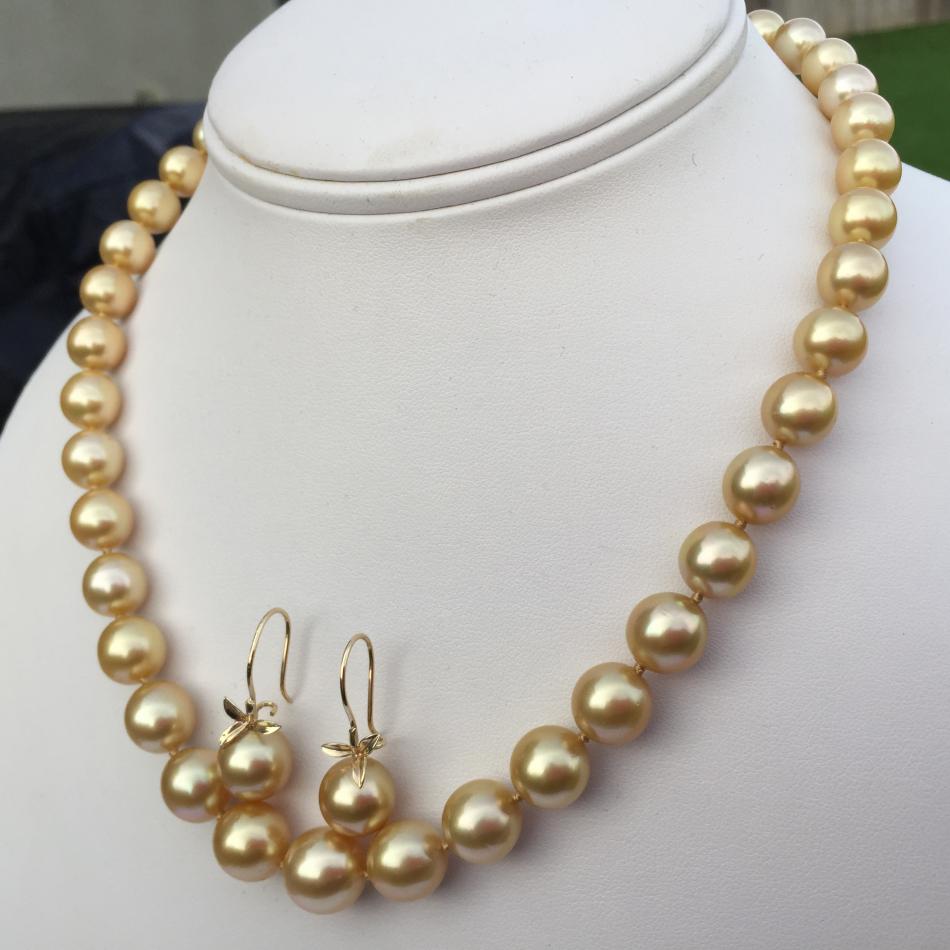 golden pearl strand with earrings side shot