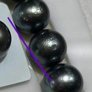 Surface issues of a Tahitian pearl.jpg