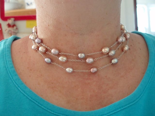 Long tin cup strand with natural color freshwater pearls