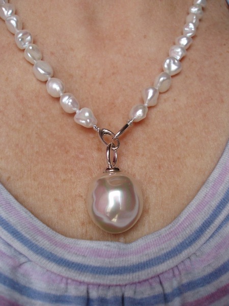 Using oval push clasp in front to hang pendant.jpeg