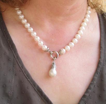 white Tahitian drop a couple of years ago from Sarah at Kojima Pearl. It has silvery overtones, and looks almost as white as this freshwater strand from Pearl Paradise