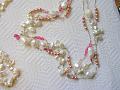 very long silver necklace with small pink pearls, keshi petals, white baroques and pink sapphires an