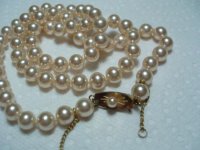 Vintage imitation strand with safety chain.jpg