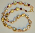 Pondslimes from Sarah with rubies, rose quartz and vermeil toggle from Nina Design