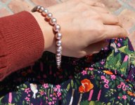 Graduated exotic color freshadama pearl bracelet on wrist
