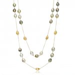 10-12mm baroque Tahitians in 3s alternating with gold nuggets.jpg