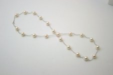 Extra hanadama pearls used in tin cup - from Pearl Paradise