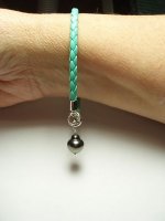 braided bracelet with ginger-pot Tahitian pearl.jpg