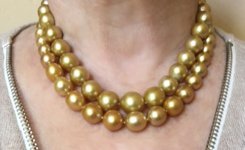 Although both are deep golden, the luster on the PP necklace is mirror