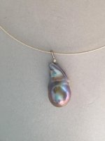 Today I have on a lavender fireball/flameball pendant. The setting is from Pearl Paradise and the pearl from Kongs pearls on Etsy. It measures 31mm by 16mm
