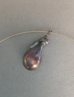 Today I have on a lavender fireball/flameball pendant. The setting is from Pearl Paradise and the pearl from Kongs pearls on Etsy. It measures 31mm by 16mm