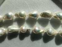 Today I have on a strand of white freshwater fireball pearls