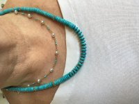 akoya pearls with tiny turquoise beads shown with a strand of Sleeping Beauty turquois