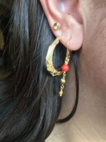 coral and tiny pipi pearl earrings close up