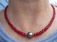 Ruby and Tahitian necklace outdoors cloudy day.jpg