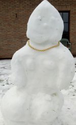 snowman wearing pearl strand