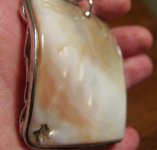 pearl blister pendant back holding.jpg