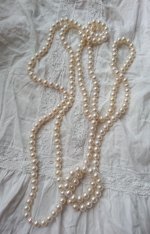  60inch have more white pearls and are about 8-9mm