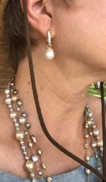 Metallic drops on Mom's diamond oval earrings