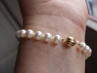 White 7mm Majorica bracelet, 750 melon clasp PG.jpeg